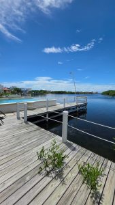 Rent Me! Wake Up to Waterfront Living | Luxury 3-Bed Home w/ Pool & Office +501.610.2731