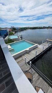 Rent Me! Wake Up to Waterfront Living | Luxury 3-Bed Home w/ Pool & Office +501.610.2731